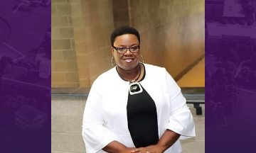 Dr. Valtreasa Tolliver-Cook, smiling, wearing professional attire.